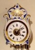 Nr. 382. Jockele-Uhr, small Black Forest porcelain clock, striking on a bell, alarm, ca. 1850.